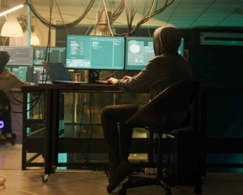 Male spy creating breach of security after gaining access to network system Male spy creating breach of security after gaining access to network system